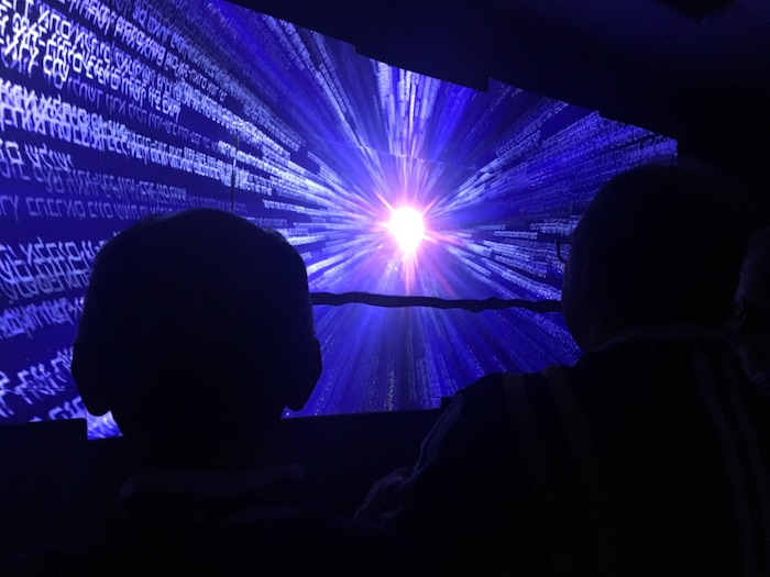 (Thomas Burr | The Salt Lake Tribune) Patrons watch a video portraying God's creation of the heavens and the Earth at the new Museum of the Bible in Washington on Wednesday.