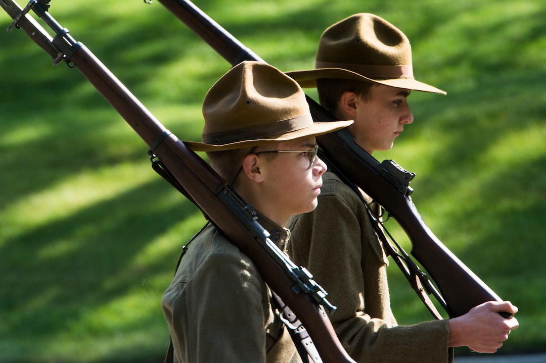 (Rick Egan  |  The Salt Lake Tribune)      Ian Herbert and Wade Stout march to the Fort Douglas Cemetery for Memorial Day observance, with the Utah Military History Group, Monday, May 28, 2018.