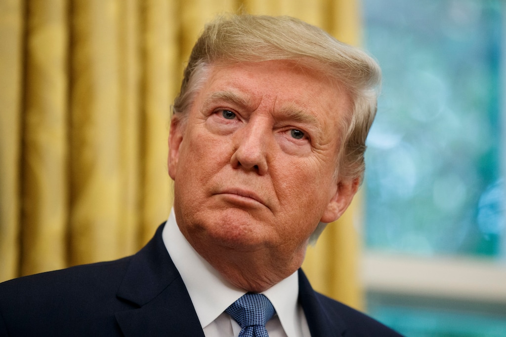 President Donald Trump listens as former NBA basketball player and coach Bob Cousy, of the Boston Celtics, speaks during a Presidential Medal of Freedom ceremony, in the Oval Office of the White House, Thursday, Aug. 22, 2019, in Washington. (AP Photo/Alex Brandon)