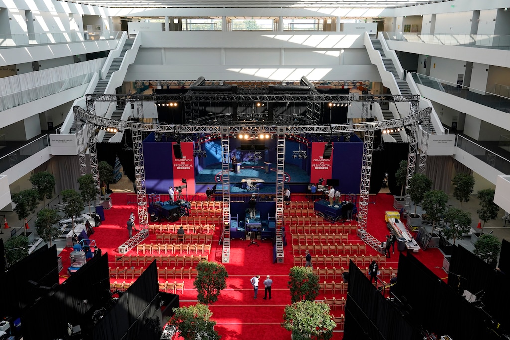 (Patrick Semansky | AP)  Preparations take place for the first Presidential debate in the Sheila and Eric Samson Pavilion, Monday, Sept. 28, 2020, in Cleveland. The first debate between President Donald Trump and Democratic presidential candidate, former Vice President Joe Biden is scheduled to take place Tuesday, Sept. 29.