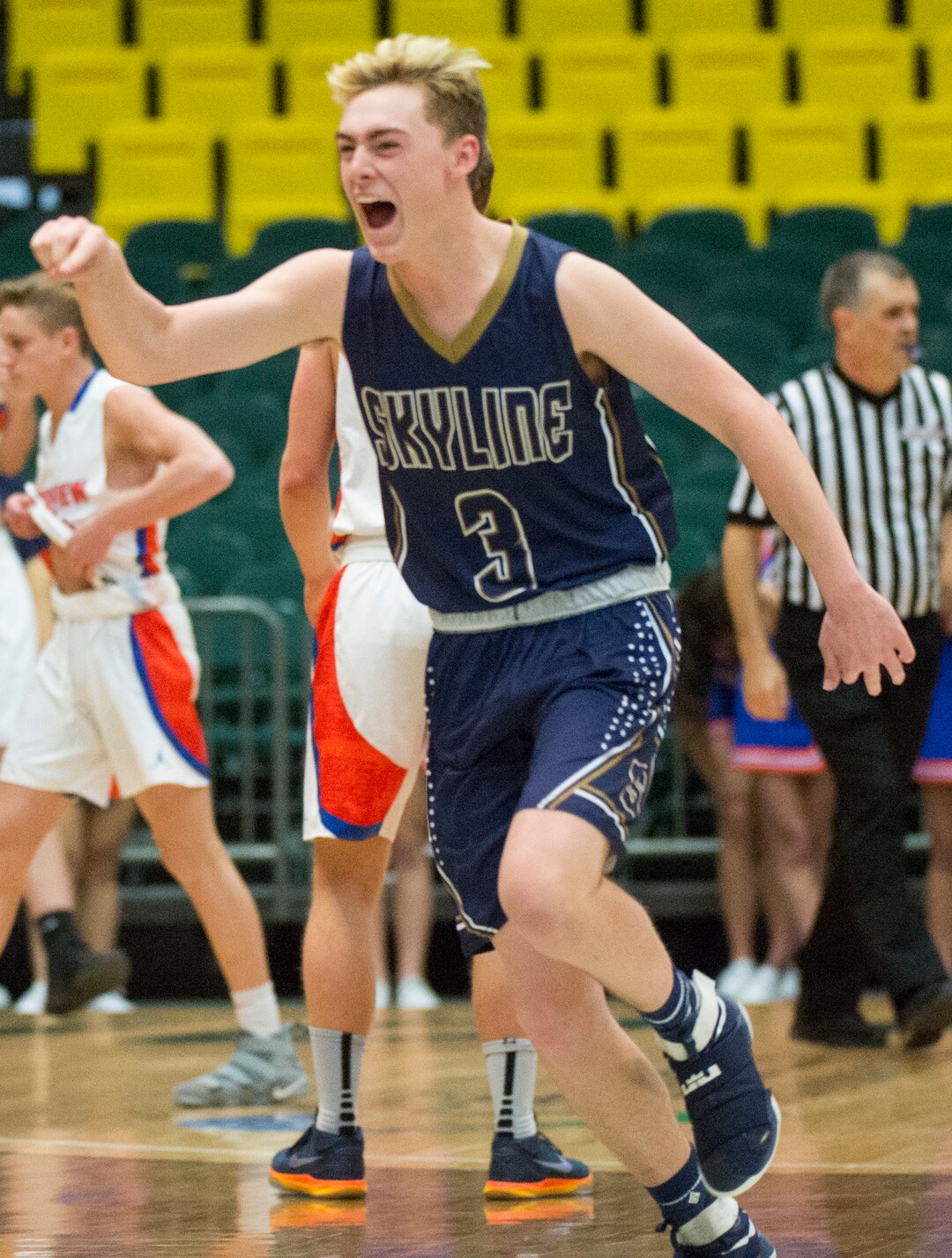 (Rick Egan  |  The Salt Lake Tribune)  Skyline Eagles Tommy McGrath (3) celebrates their 67-63 win over Timpview, in 5A basketball playoff action between the Timpview Thunderbirds and at the Skyline Eagles, at the UCCU Center in Orem, Monday, Feb. 26, 2018.