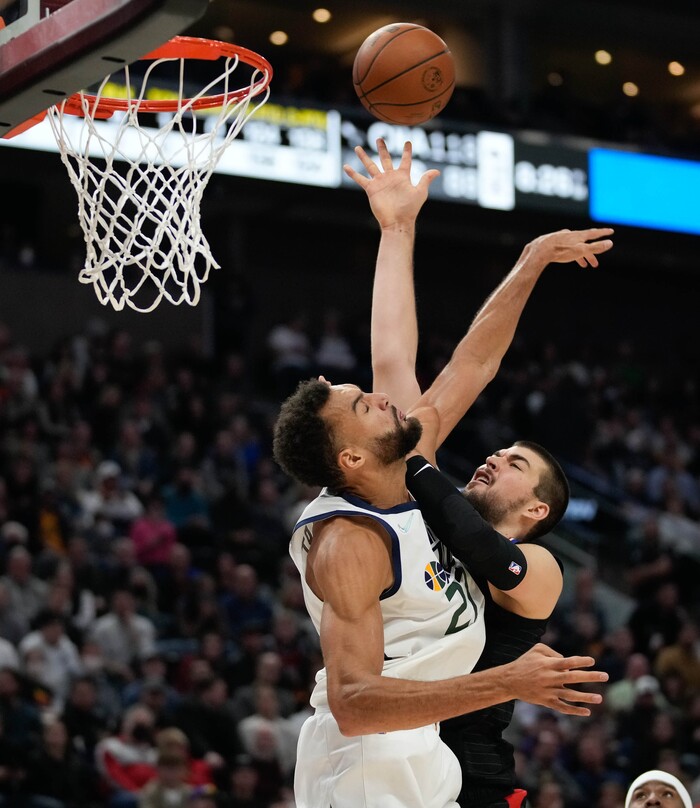 (Francisco Kjolseth | The Salt Lake Tribune) Utah Jazz center Rudy Gobert (27) puts the block on LA Clippers center Ivica Zubac (40) in NBA action between the Utah Jazz and the LA Clippers at Vivint Smart Home Arena in Salt Lake City, Wednesday, Dec. 15, 2021.