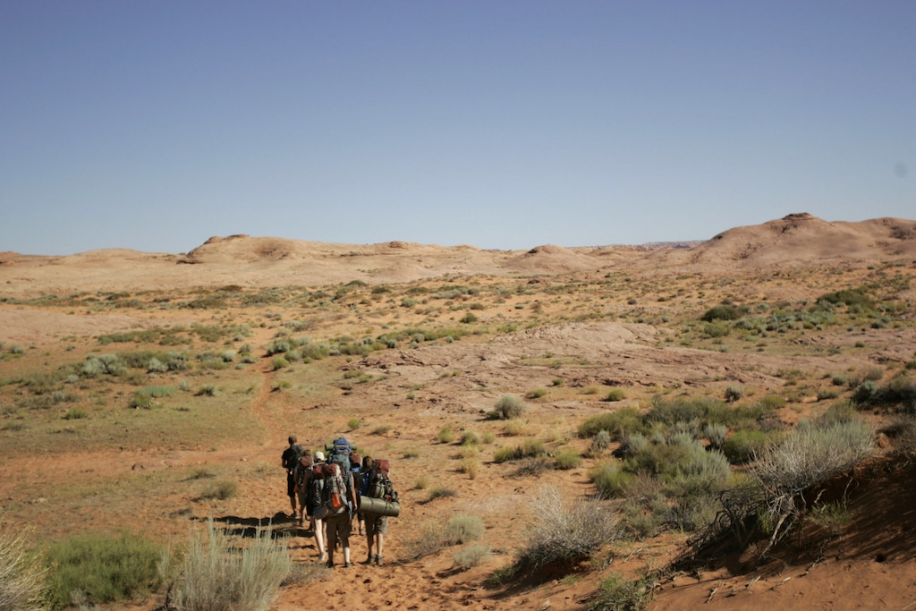 (Jim Urquhart | The Salt Lake Tribune) Teens and guides from Aspiro hike across the desert in Southern Utah in 2008 during an adventure therapy program for troubled teens. Aspiro announced last April it was closing due to “recessionary and economic factors." It was the first of four Utah wilderness therapy programs to close in the last year.