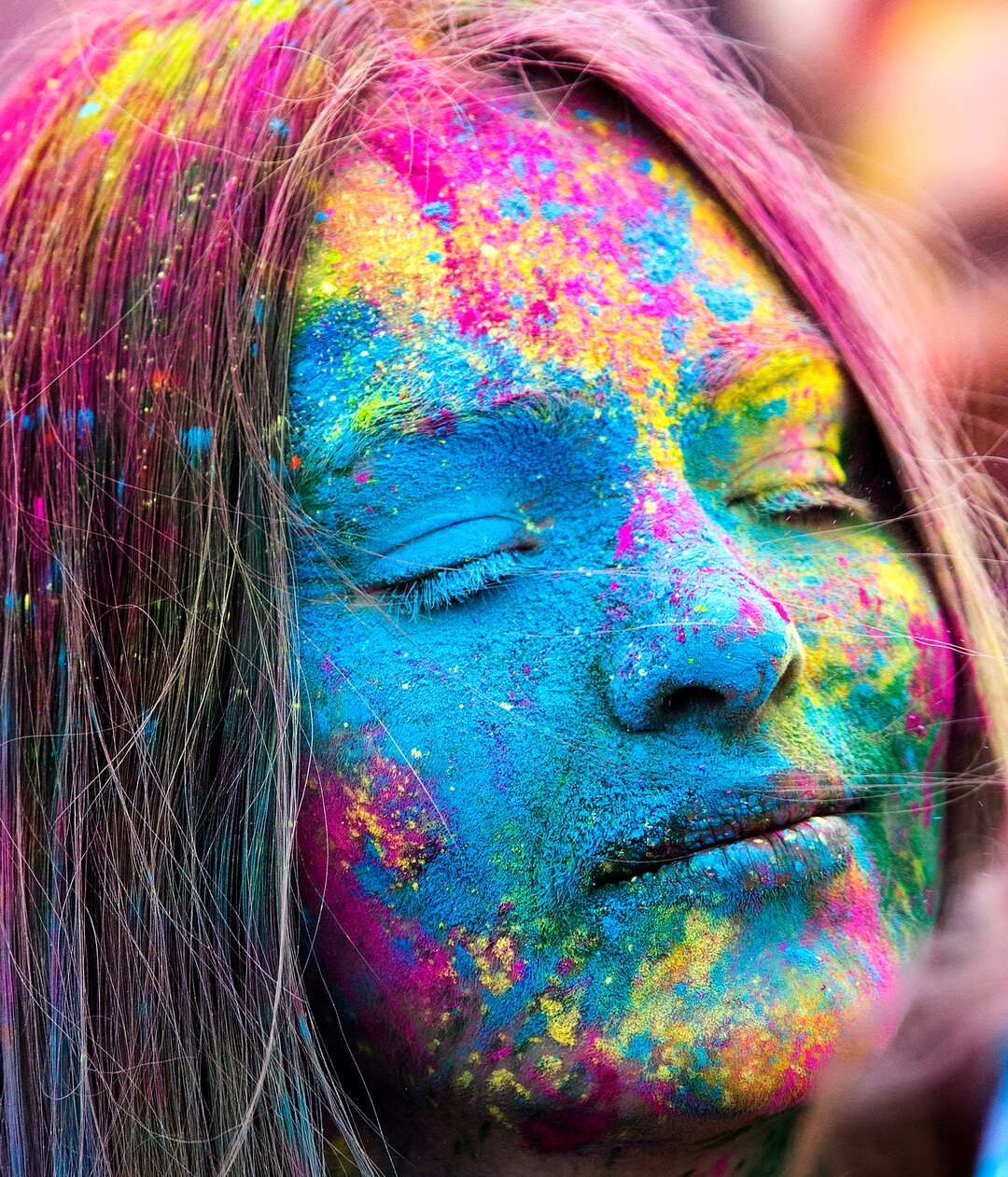 (Rick Egan  |  The Salt Lake Tribune)      Ruth Voss from Provo sways to the music of Jai Krishna & Ananda Groove, during the 22nd annual Holi Festival of Colors at the Sri Sri Radha Krishna Temple in Spanish Fork, Saturday, March 24, 2018. The festival which celebrates the beginning or spring is also known as at the Festival of Love.