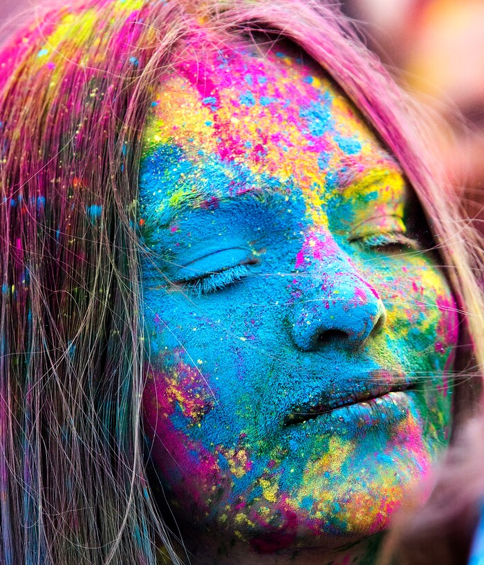 (Rick Egan  |  The Salt Lake Tribune)      Ruth Voss from Provo sways to the music of Jai Krishna & Ananda Groove, during the 22nd annual Holi Festival of Colors at the Sri Sri Radha Krishna Temple in Spanish Fork, Saturday, March 24, 2018. The festival which celebrates the beginning or spring is also known as at the Festival of Love.