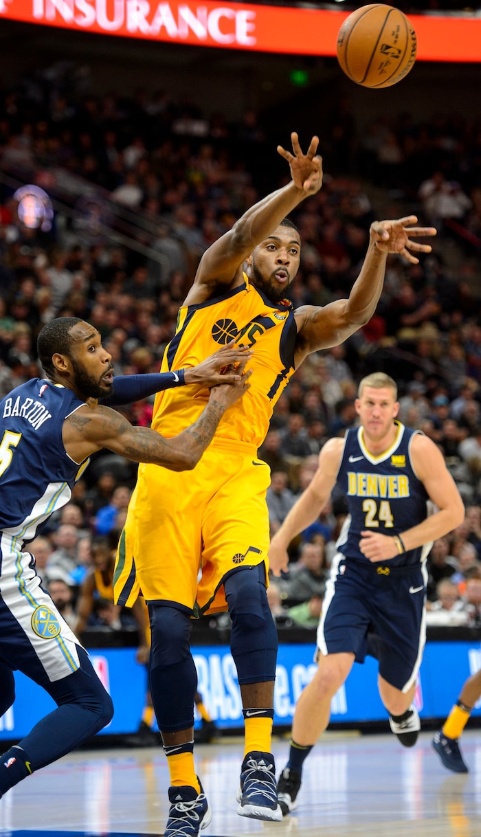 (Steve Griffin  |  The Salt Lake Tribune) Utah Jazz forward Derrick Favors (15) passes to the corner during the Utah Jazz versus Denver Nuggets NBA basketball game at Vivint Smart Home Arena  in Salt Lake City Tuesday November 28, 2017.