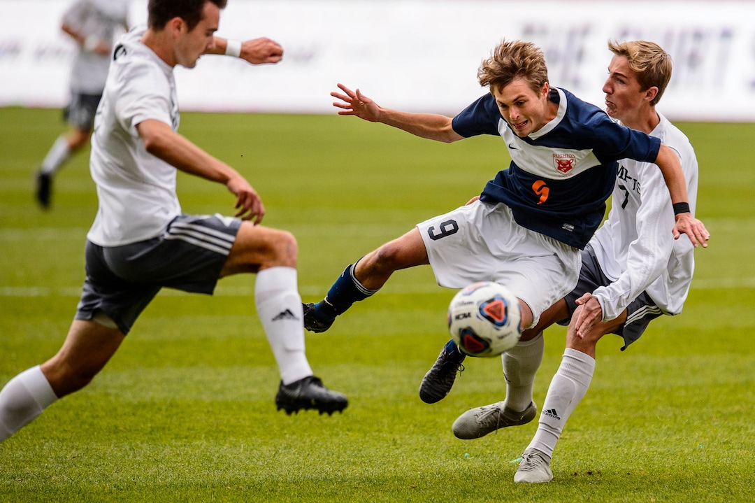 (Trent Nelson  |  The Salt Lake Tribune)  Brighton's Alex Fankhauser (9) andOlympus's Lincoln Buchanon (7) as Olympus faces Brighton High School in the 5A boys state championship game at Rio Tinto Stadium in Sandy, Thursday May 23, 2019.
