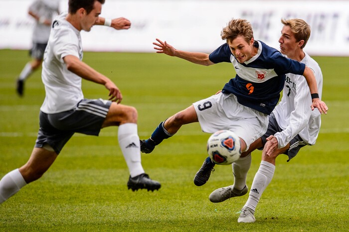 (Trent Nelson  |  The Salt Lake Tribune)  
Brighton's Alex Fankhauser (9) andOlympus's Lincoln Buchanon (7) as Olympus faces Brighton High School in the 5A boys state championship game at Rio Tinto Stadium in Sandy, Thursday May 23, 2019.