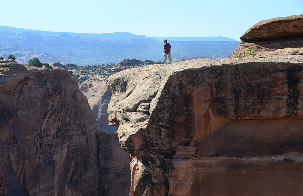 (Scott Sommerdorf | The Salt Lake Tribune) Former Interior Secretary Sally Jewell stands alone and looks out over a vista as she tours the Gemini Bridges area in 2016. This week, an appeals board rejected requests made by the State of Utah and recreation advocacy groups to keep roads open to motorized use in this area while the board comes to its final decision on whether the road closures will be permanent.