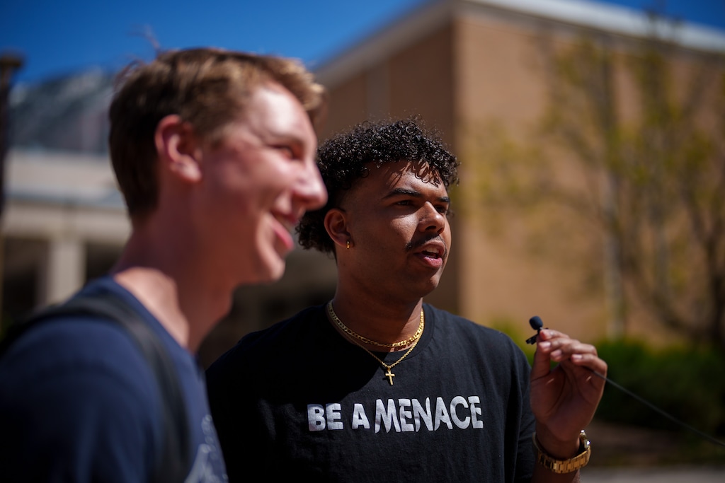 (Trent Nelson | The Salt Lake Tribune) Sebastian Stewart-Johnson, a member of BYU's Black Menaces, films a TikTok video with a student in Provo on Friday, April 8, 2022. A BYU staff member threatened Stewart-Johnson and reported him to campus police on September 19, 2023 for filming on campus; Stewart-Johnson said he isn't breaking the rules.
