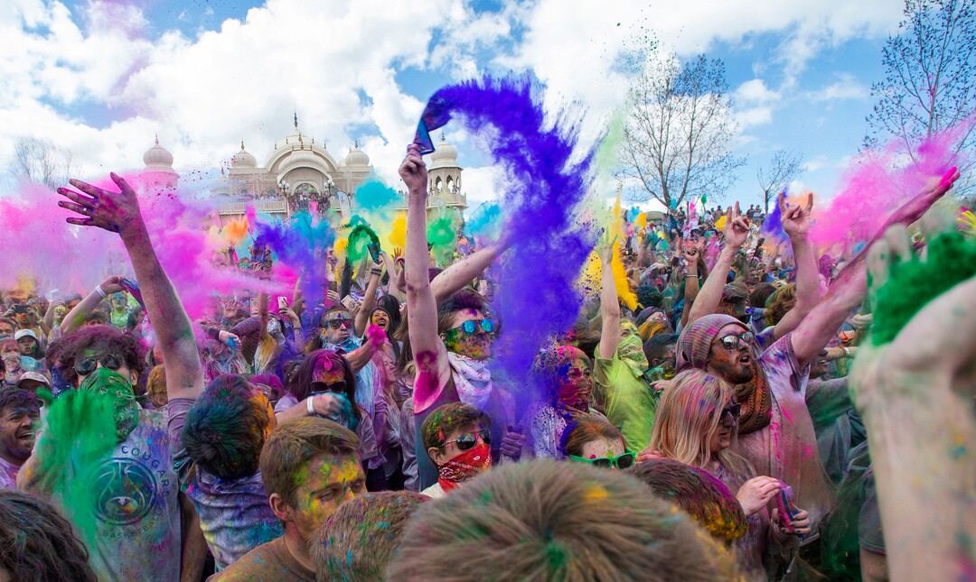 (Rick Egan  |  The Salt Lake Tribune)   Revelers toss colored powder into the air as they celebrate the arrival of spring, during the Holi Festival of Colors celebration at the Sri Sri Radha Krishna Temple in Spanish Fork, Saturday, March 30, 2019.