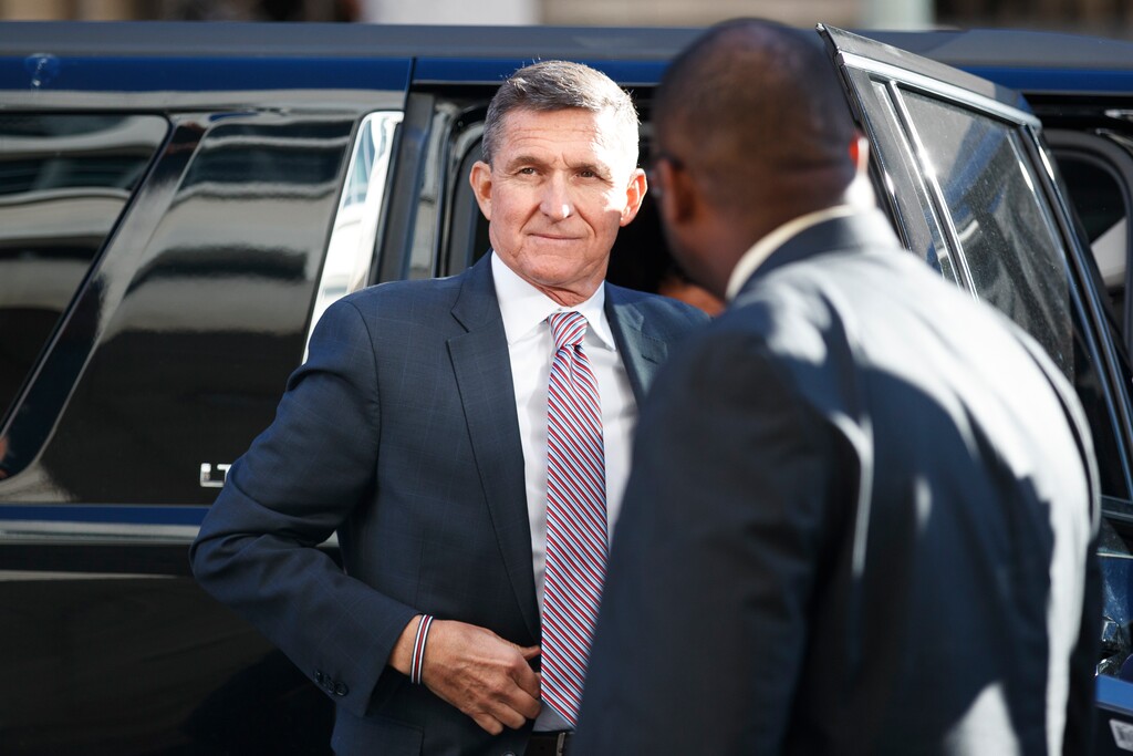 (Carolyn Kaster | AP Photo) President Donald Trump's former National Security Advisor Michael Flynn arrives at federal court in Washington, Tuesday, Dec. 18, 2018.
