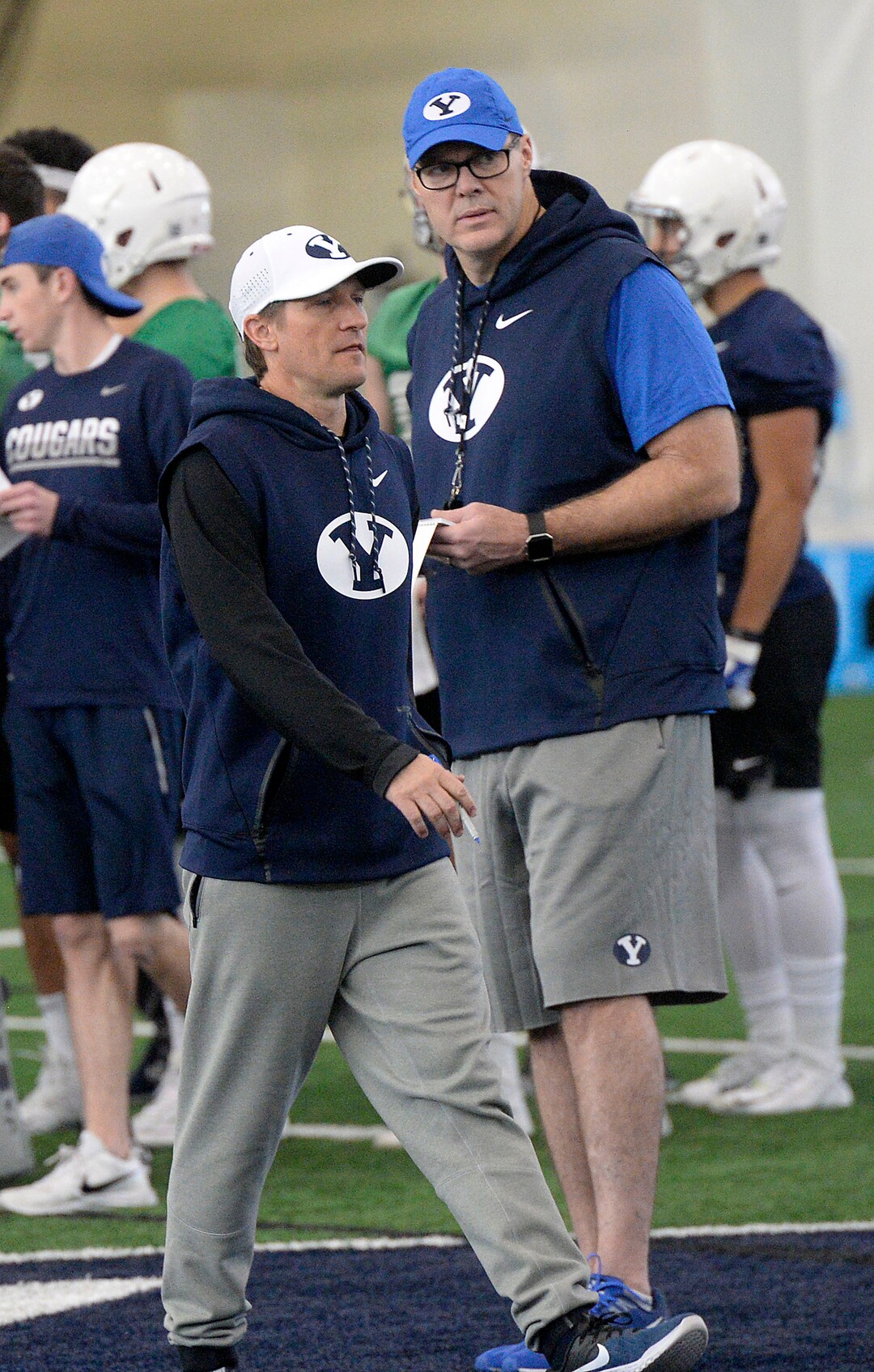 (Al Hartmann  |  The Salt Lake Tribune) 	 BYU opened spring football camp on Monday March 5 in the Indoor Playing facility with some new offensive coaching staff, quarterback coach Aaron Roderick, left, and offensive coordinator Jeff Grimes. 