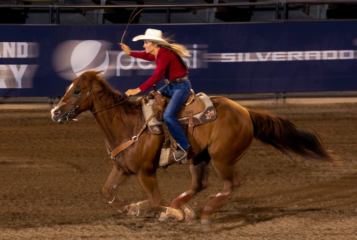 (Rick Egan | The Salt Lake Tribune)  Halyn Lide, from China Spring, Texas, competes in the barrel racing event at the Utah Days of '47 Rodeo at the State Fairpark, on Monday, July 25, 2022.