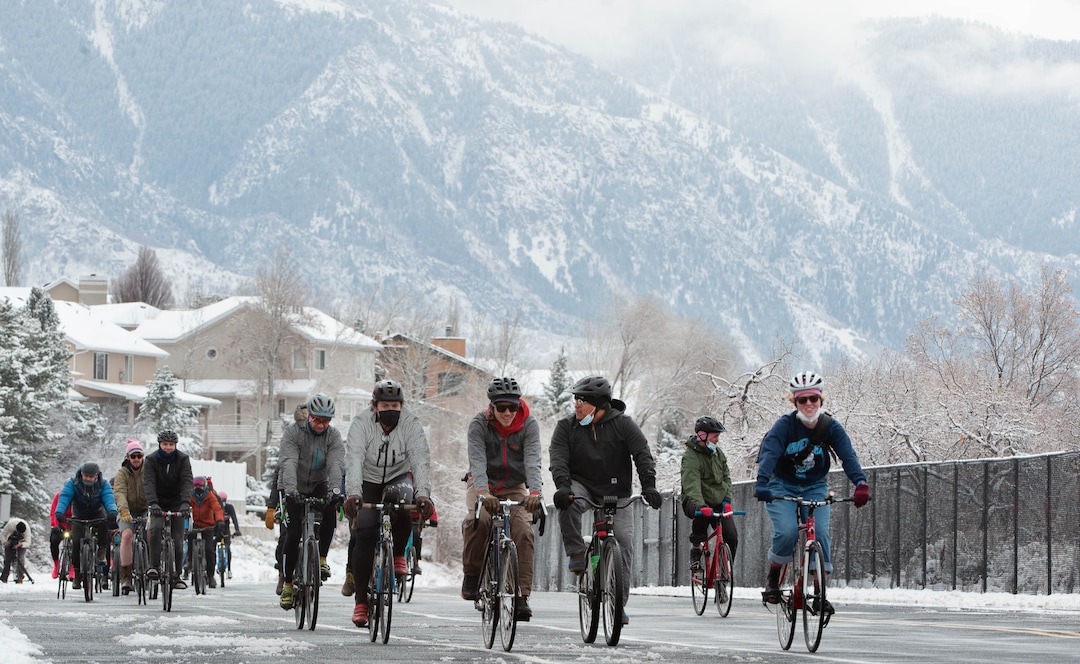 (Francisco Kjolseth  | The Salt Lake Tribune) Fresh snow blankets the mountains as people participate in a memorial bike ride along Wasatch Blvd in Salt Lake City on Sunday, Feb. 14, 2021, in honor of the four who died in an avalanche on Saturday, Feb. 6.