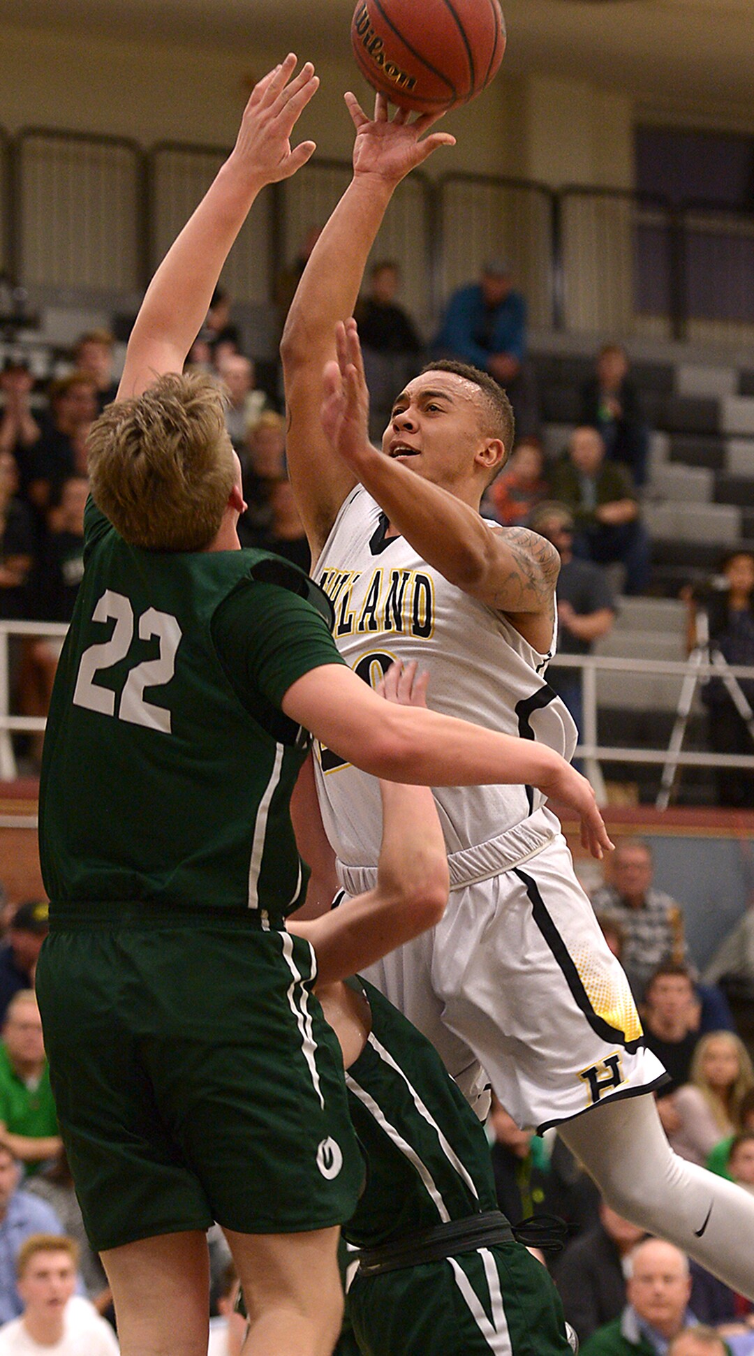 (Leah Hogsten  |  The Salt Lake Tribune) Highland's Elijah Shelton aims for the net. Olympus High School defeated Highland High School 86-54 during their basketball game, Tuesday, February 6, 2018.