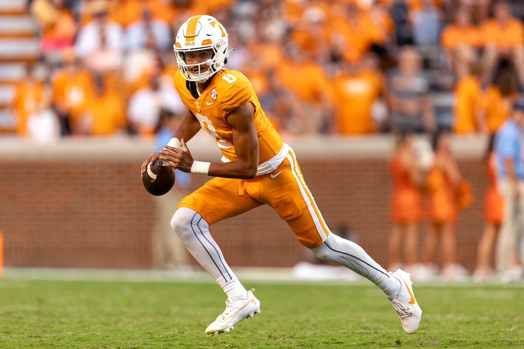 Tennessee quarterback Nico Iamaleava (8) looks for a receiver as he rolls out to pass during the second half of an NCAA college football game against UTSA, Saturday, Sept. 23, 2023, in Knoxville, Tenn. (AP Photo/Wade Payne)