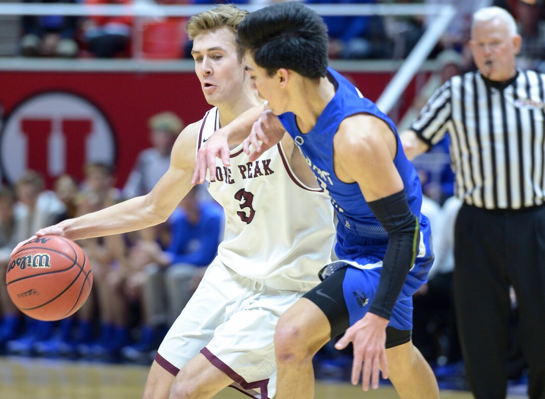 (Leah Hogsten  |  The Salt Lake Tribune) Lone Peak's Steven Ashworth (03) battles Pleasant Grove's Kawika Akina (21) to get down the court. Lone Peak defeated Pleasant Grove 61-44 to win the 6A High School Boys’ Basketball Tournament Championship at the Jon M. Huntsman Center in Salt Lake City, Saturday, March 3, 2018. 