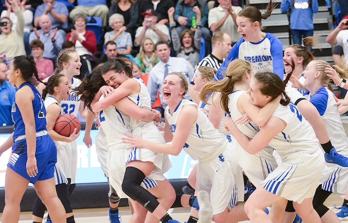 (Leah Hogsten  |  The Salt Lake Tribune) Fremont celebrates the win. Fremont defeated Bingham 61-47 to win the 6A High School Girls' Basketball Tournament title at SLCC in Taylorsville,Saturday, Feb. 24, 2018. 