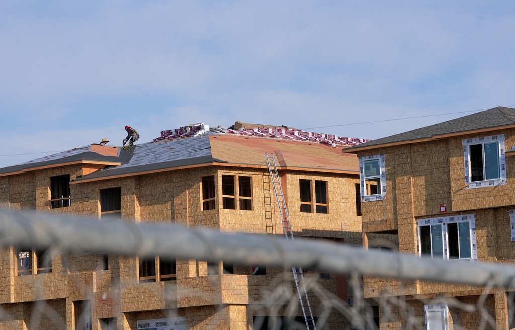 (Chris Samuels | The Salt Lake Tribune) Construction takes place Wednesday, Sept. 11, 2024, at Innovation Park at Holbrook Farms, a restricted-income townhome development in Lehi where people will pay different rates based on their income. Figures provided to The Tribune work out to about 30% or income. According to federal data, about 27% of Utah households spend more than 30% of their income on housing costs.