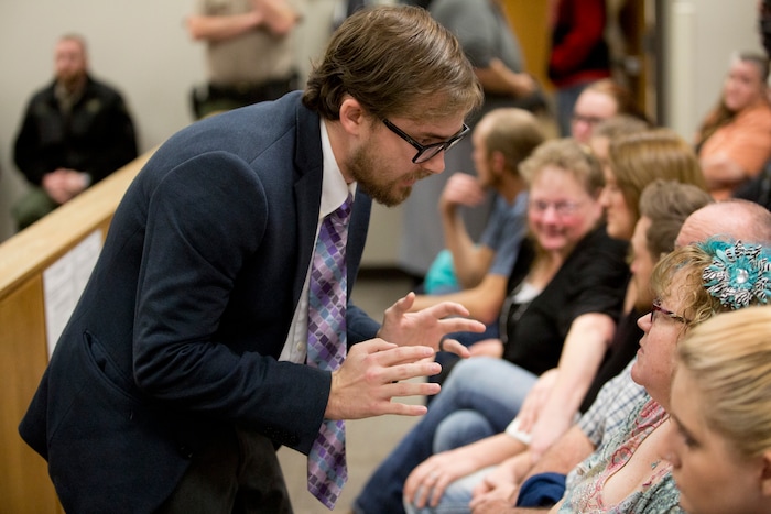 Brandon Merrill, the Utah program direction and attorney for The Never Again Foundation, speaks with Sue Bryan, Jchandra Brown's mother, before Tyerell Przybycien's sentencing in the 4th District Court on Friday, Dec. 7, 2018, in Provo.