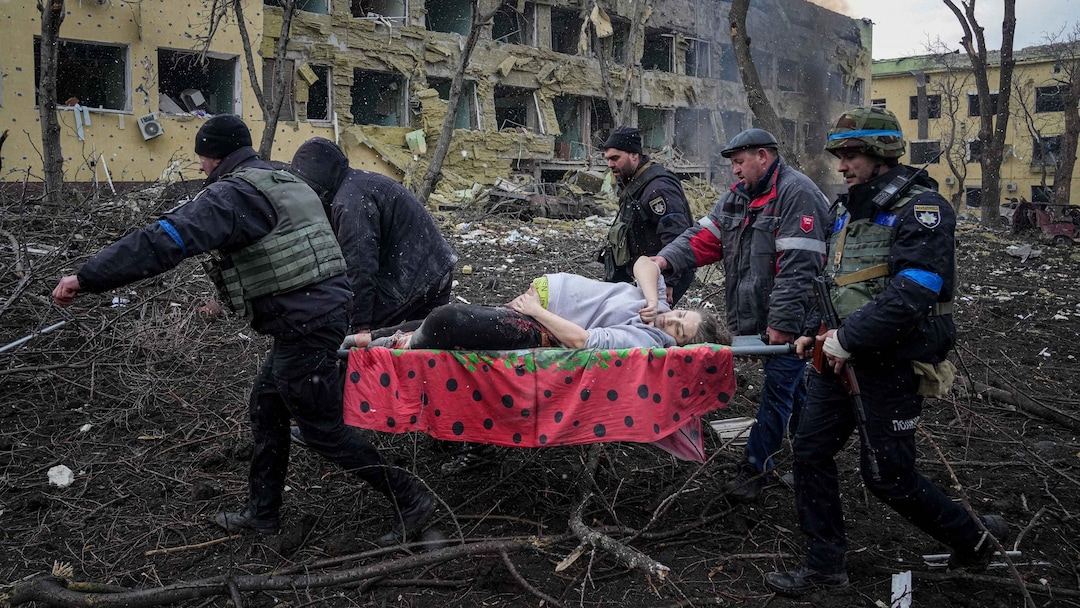 (Evgeniy Maloletka  |  Sundance Institute) First responders help an injured woman in director Mstyslav Chernov's documentary from Ukraine, "20 Days in Mariupol," an official selection of the World Documentary Competition at the 2023 Sundance Film Festival.
