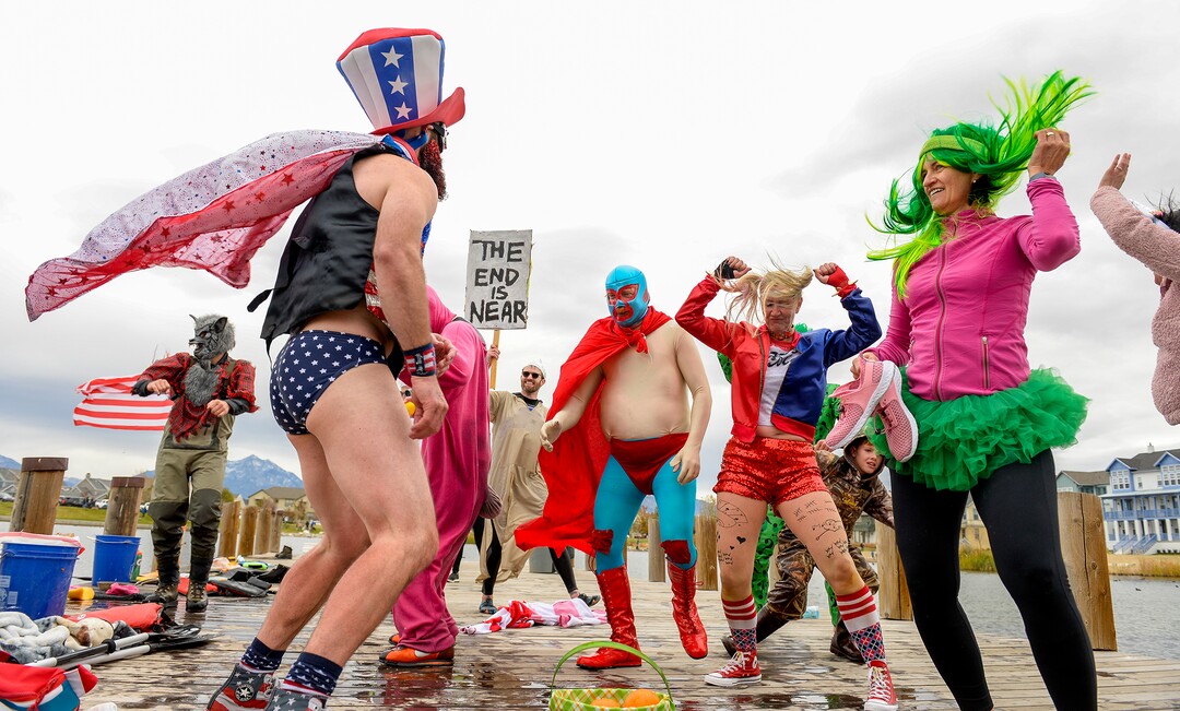 (Leah Hogsten  |  The Salt Lake Tribune) Regatta sailors break into moves during a dance contest at the annual Giant Pumpkin Regatta, October 19, 2019 on Oquirrh Lake in Daybreak, South Jordan.