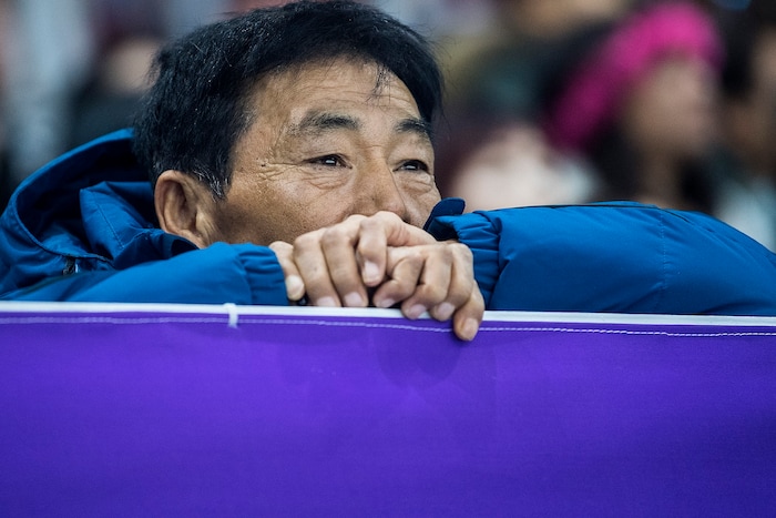(Chris Detrick  |  The Salt Lake Tribune)  A man watches the Men's 500m Short Track Speed Skating at Gangneung Ice Arena Pyeongchang 2018 Winter Olympics Tuesday, Feb. 20, 2018. 