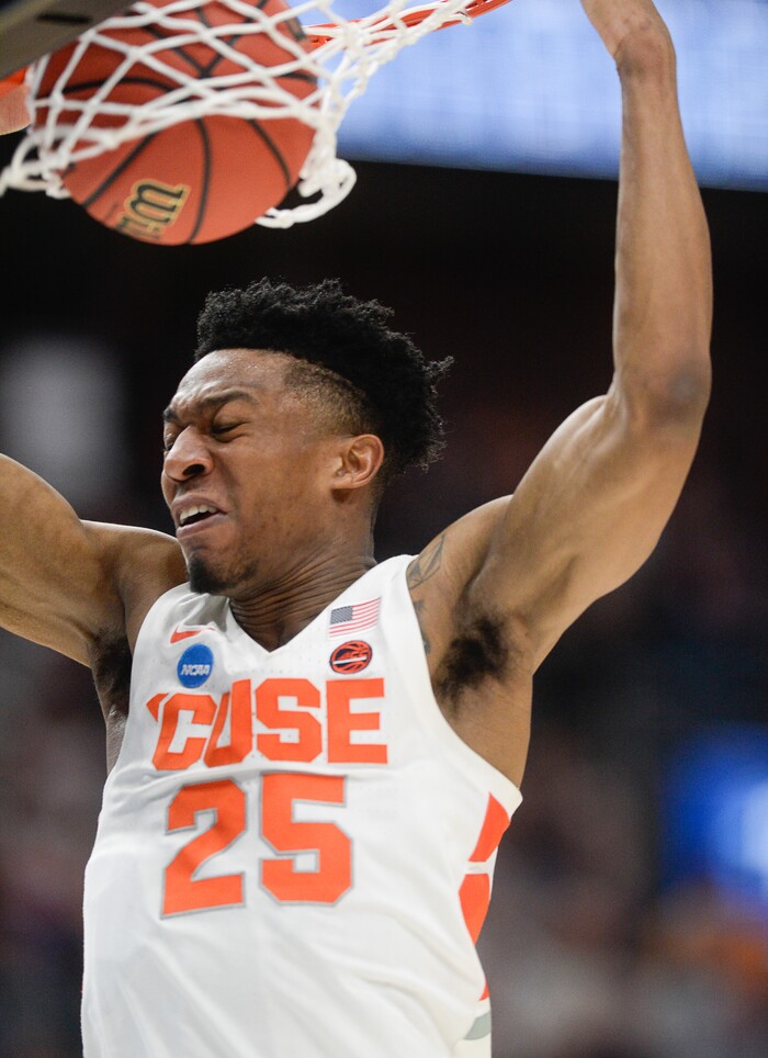 (Francisco Kjolseth  |  The Salt Lake Tribune)  Syracuse Orange guard Tyus Battle (25) dunks the ball as Syracuse faces Baylor in their first round menÕs NCAA March Madness tournament game at Vivint Smart Home Arena in Salt Lake City on Thursday, March 21, 2019.