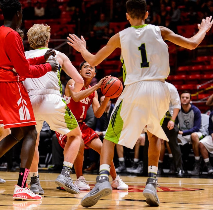 (Trent Nelson | The Salt Lake Tribune)  East vs. Timpanogos, 5A State high school basketball tournament at the Huntsman Center in Salt Lake City, Wednesday Feb. 28, 2018. East's Stanford Satini (1) looks to shoot.