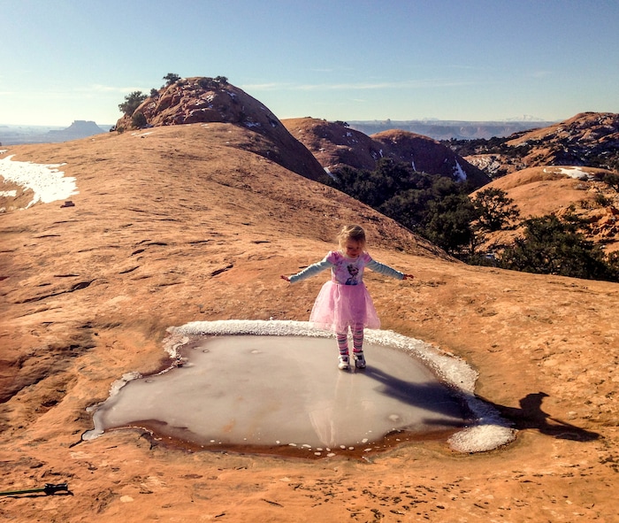 Erin Alberty  |  The Salt Lake TribuneThe author's daughter catches her balance on an icy pothole Dec. 2, 2015 on Whale Rock in Canyonlands National Park. 