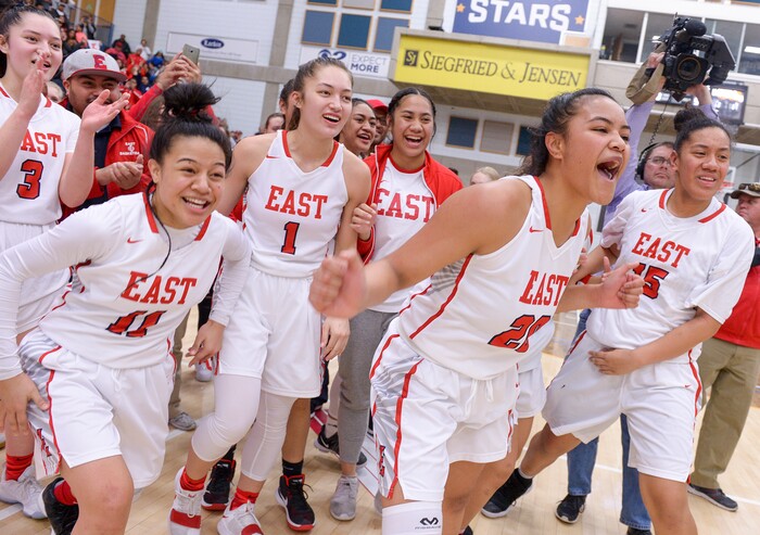 (Leah Hogsten  |  The Salt Lake Tribune) East celebrates the win.  East defeated Timpview 68-48 to win the the 5A High School Girls' Basketball Tournament title at SLCC in Taylorsville, Saturday, Feb. 24, 2018. 