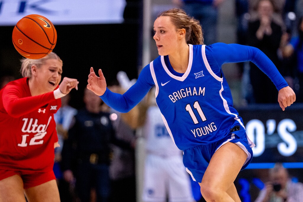 (Trent Nelson  |  The Salt Lake Tribune) BYU guard Delaney Gibb (11) steals the ball from Utah forward Chyra Evans (12) as BYU hosts Utah, NCAA basketball in Provo on Saturday, Jan. 31, 2026.