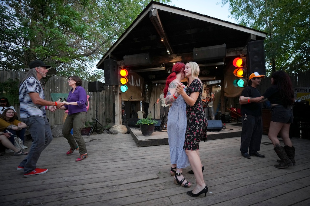 (Bethany Baker  |  The Salt Lake Tribune) Customers dance as the band plays at Garage on Beck in Salt Lake City on Thursday, May 29, 2025. The roadside bar, that's operated along U.S. 89 for decades, will close permanently on May 31.