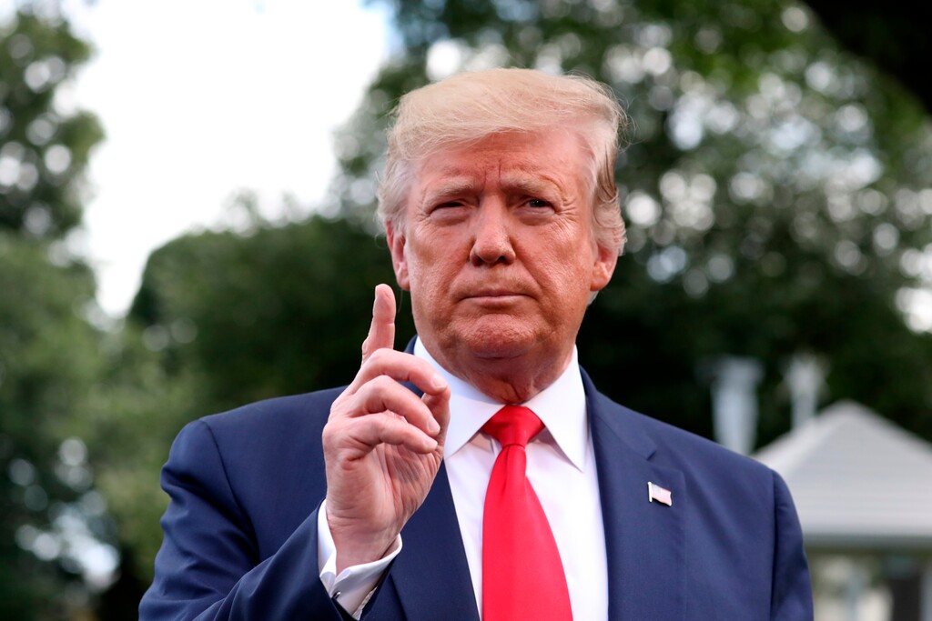 (Andrew Harnik | AP Photo) President Donald Trump speaks with the media before boarding Marine One on the South Lawn of the White House, Tuesday, June 18, 2019, in Washington. Trump is en route to Orlando, Fla., to announce his bid for re-election.