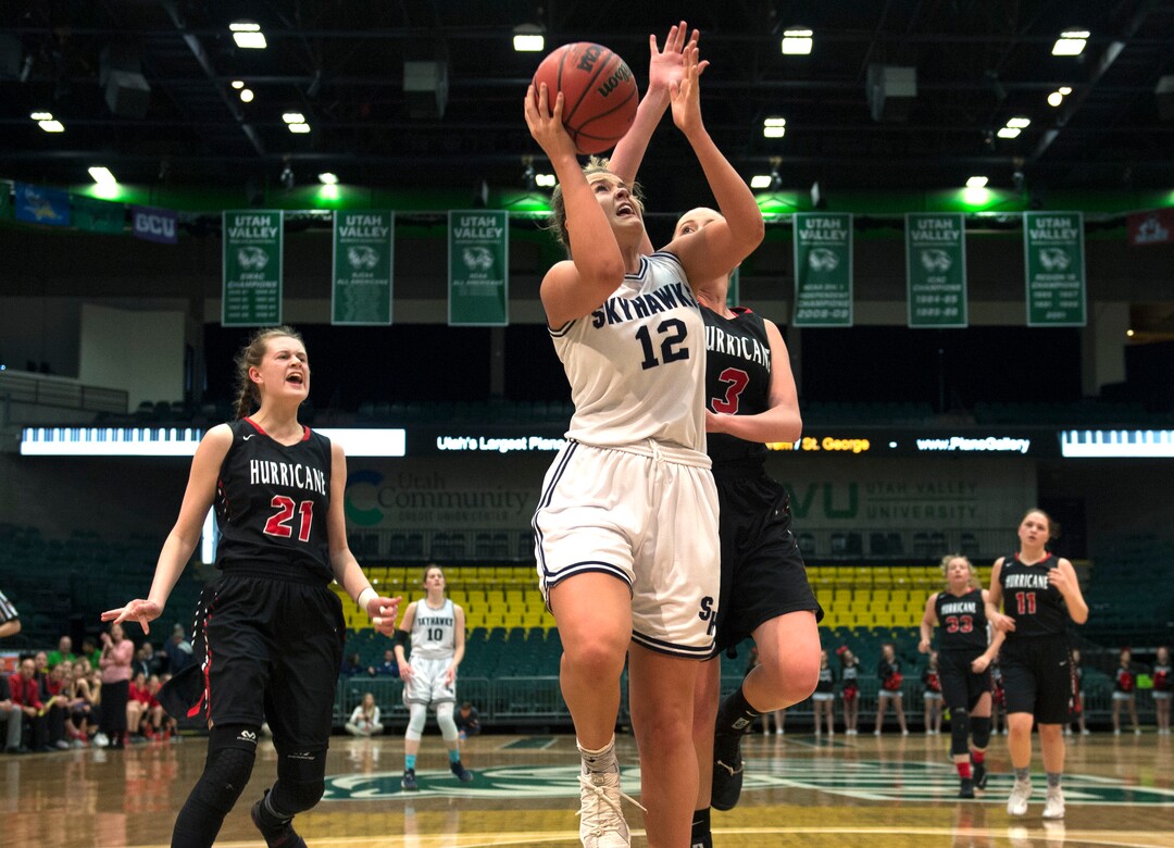 Scott Sommerdorf | The Salt Lake TribuneThe Hurricane defense can only shout as Lauren Gustin drives for two of her 32 points. Salem Hills beat Hurricane 57-35 for the 4A girl's title, Saturday, March 3, 2018.