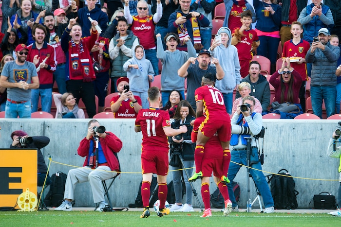 (Chris Detrick  |  The Salt Lake Tribune)  Real Salt Lake forward Brooks Lennon (27) celebrates with Real Salt Lake forward Joao Plata (10) after scoring a goal past Sporting Kansas City goalkeeper Andrew Dykstra (21) during the game at Rio Tinto Stadium Sunday, October 22, 2017.  