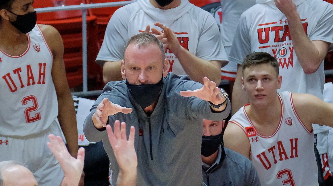 (Leah Hogsten | The Salt Lake Tribune) Utah Utes head coach Larry Krystkowiak celebrates play as the University of Utah host the Arizona Wildcats, Feb. 4, 2021 at the Jon M. Huntsman Arena.