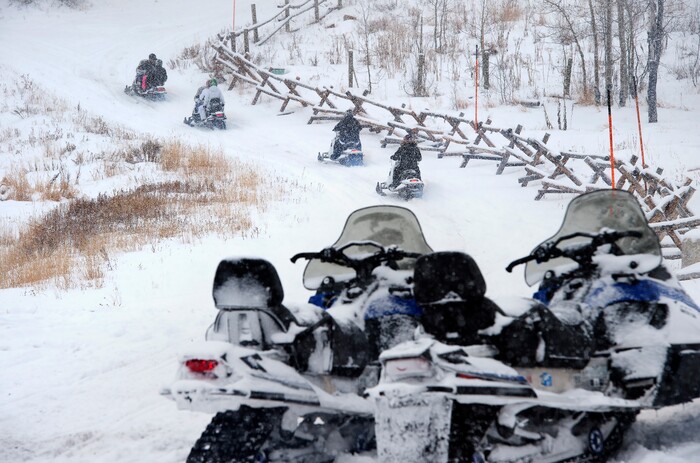 (Scott Sommerdorf   |  The Salt Lake Tribune)   
The Varvell family visiting from Connecticut rented snowmobiles at Daniel Summit Saturday, December 23, 2017. While the number of snowmobile licenses in Utah is declining, trail usage is up dramatically.  