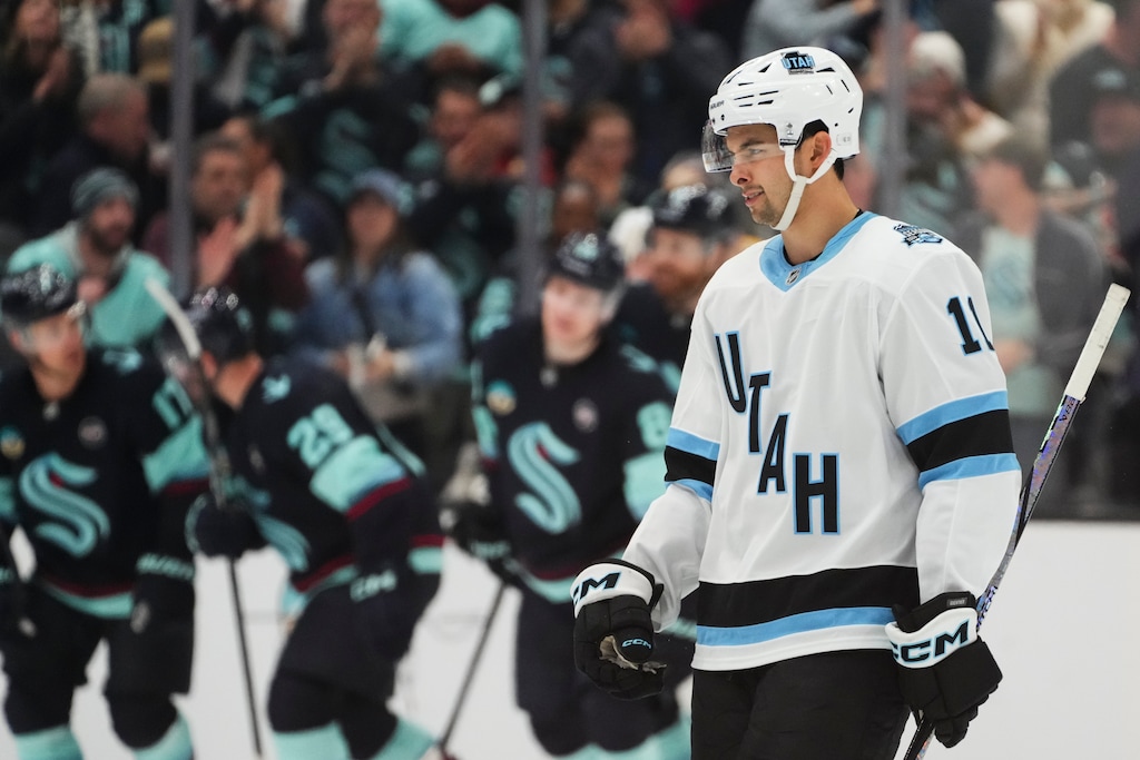 Utah Hockey Club right wing Dylan Guenther reacts after a goal by the Seattle Kraken during the third period of an NHL hockey game Monday, Dec. 30, 2024, in Seattle. (AP Photo/Lindsey Wasson)