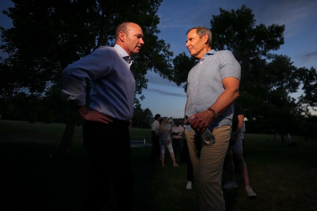 (Bethany Baker | The Salt Lake Tribune) U.S. Sen. Mike Lee, left, meets with U.S. Sen. candidate Rep. John Curtis during a watch party in Provo on Tuesday, June 25, 2024.