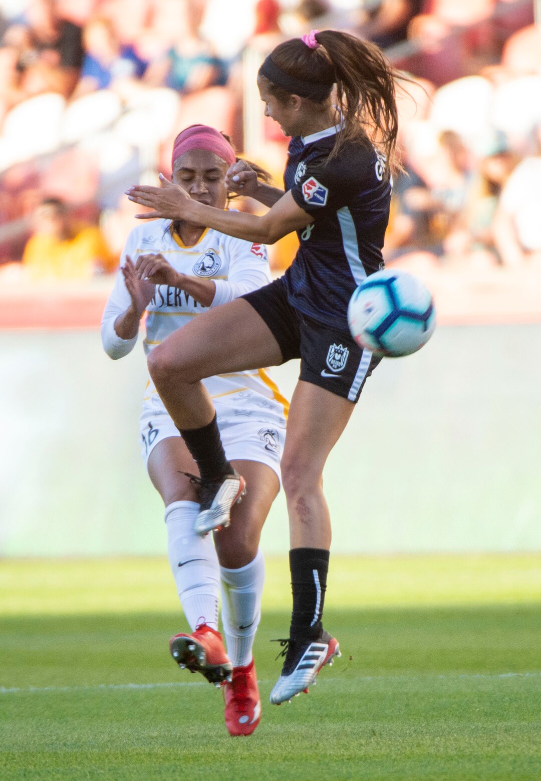 (Rick Egan  |  The Salt Lake Tribune)   Utah Royals FC defender Samantha Johnson (16) collides with Seattle Reign FC forward Shea Groom (2) in soccer action between Utah Royals FC and Seattle Reign FC in Sandy, Friday, June 28, 2019.