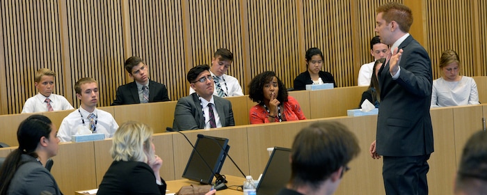 (Al Hartmann | The Salt Lake Tribune)
BYU law student Joshua Prince, right, acts as prosecuter in a mock trial in Judge David Nuffer's federal courtroom in Salt Lake City Wednesday Aug.22. High school students listen from the jury box. It's part of a Civics, Law and Leadership Camp. The camp, a pilot project of Brigham Young University’s J. Reuben Clark Law School and the Federal Bar Association, is designed to prepare youths for civic leadership and service.