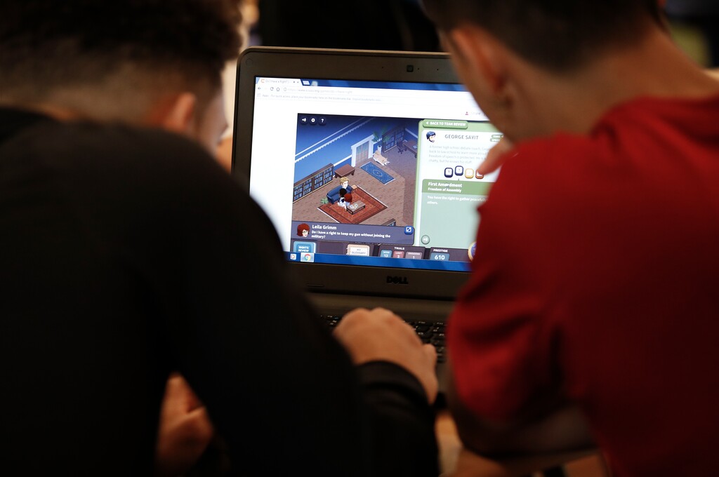 (Carolyn Kaster | AP file photo) Anton Eiss, left, and Sirio Chavez, right, work with the civics computer game iCivics during Phoebe Sherman's 11th-grade social studies class at Roosevelt High School's International Academy in Washington, Thursday, Nov. 16, 2017. Supreme Court Justice Sonia Sotomayor and former Supreme Court Justice Sandra Day O'Connor are backing iCivics, which is now being translated into Spanish.