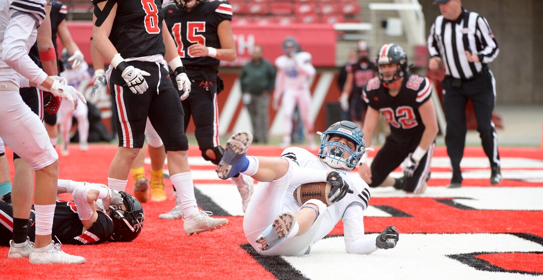 (Leah Hogsten  |  The Salt Lake Tribune) Sky ViewÕs quarterback Kason Carlsen wit the touchdown. Sky View High School defeated Park City 35-0 to win the 4A State Championship football title, Nov. 11, 2019 at Rice-Eccles Stadium.