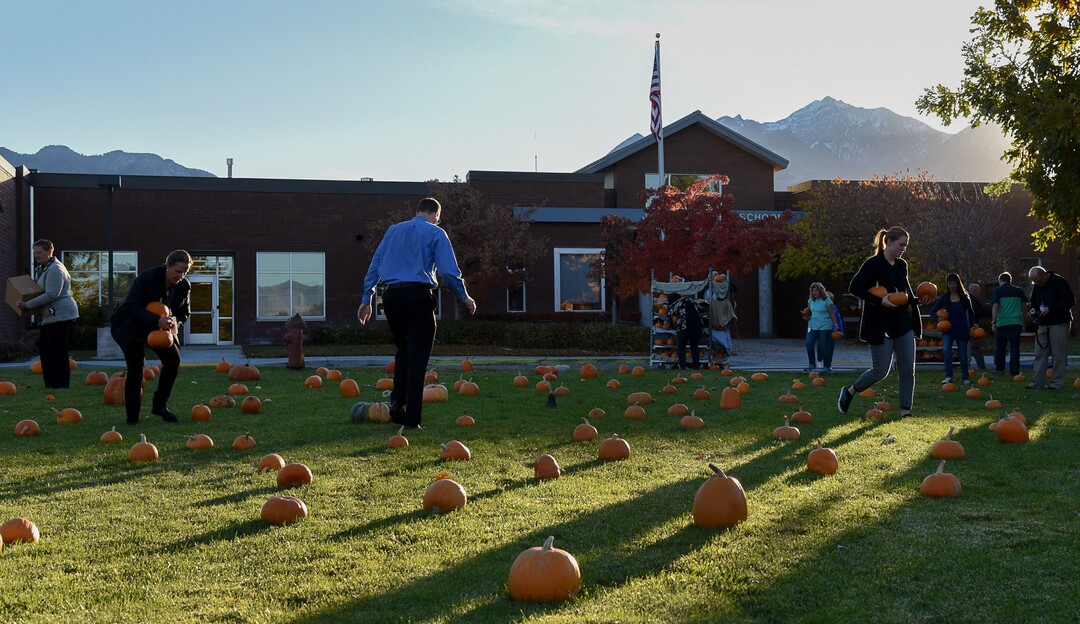 (Francisco Kjolseth  |  The Salt Lake Tribune)  A pumpkin patch is set up for students at Jordan Valley School in Midvale, Canyon District's school for students with severe disabilities, allowing them an opportunity to pick out their own pumpkin, an opportunity they look forward to on Wed. Oct. 24, 2018. Inmates who take part in the Green Thumb Nursery program at the Utah State prison grew and harvested the pumpkins that were donated to the school for the 10th year.