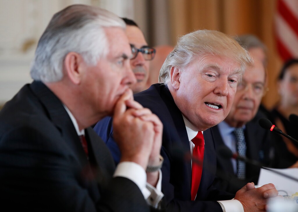 President Donald Trump, joined by Secretary of State Rex Tillerson, left, speaks during a bilateral meeting with Chinese President Xi Jinping at Mar-a-Lago, Friday, April 7, 2017, in Palm Beach, Fla.  Trump was meeting again with his Chinese counterpart Friday, with U.S. missile strikes on Syria adding weight to his threat to act unilaterally against the nuclear weapons program of China's ally, North Korea. (AP Photo/Alex Brandon)