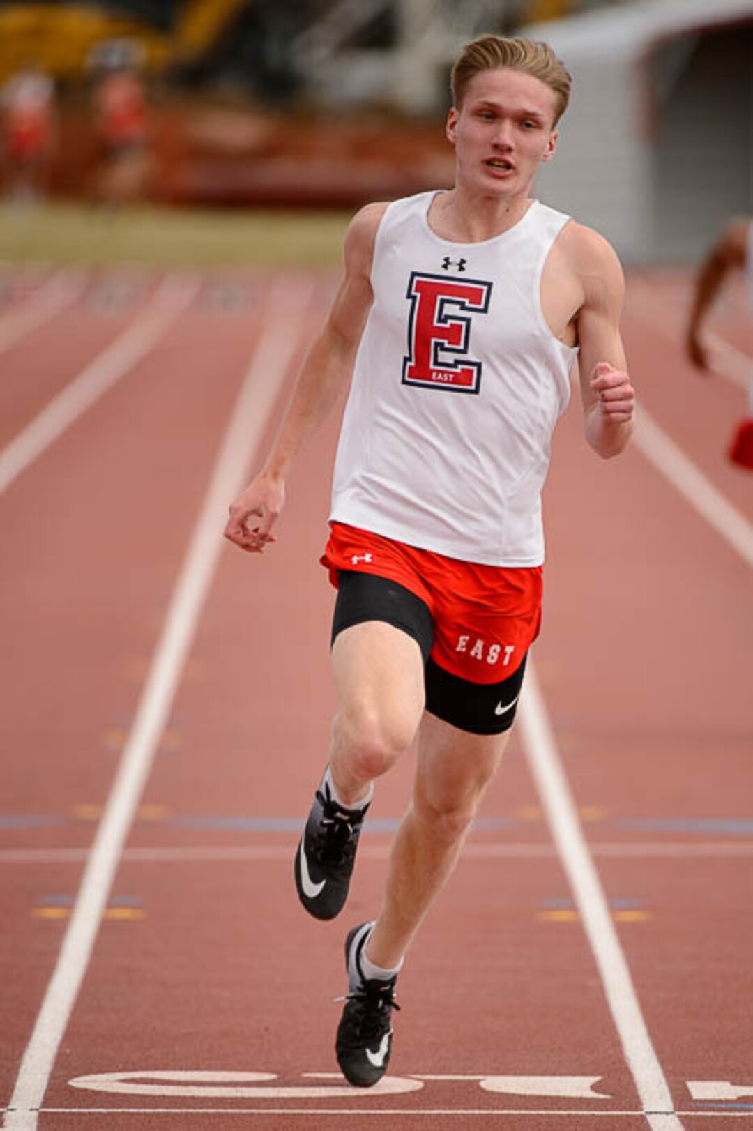(Trent Nelson | The Salt Lake Tribune)  East track star Will Prettyman, one of the state's best long jumpers and sprinters, competing in the 100m, Thursday April 5, 2018.