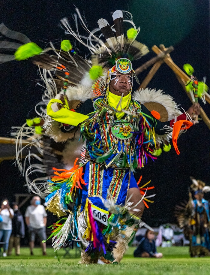 (Leah Hogsten | The Salt Lake Tribune Dancers are a whirl of regalia and color at the 41st Annual Paiute Indian Tribe of Utah Restoration Gathering, Aug. 13, 2021 in Cedar City, Utah.