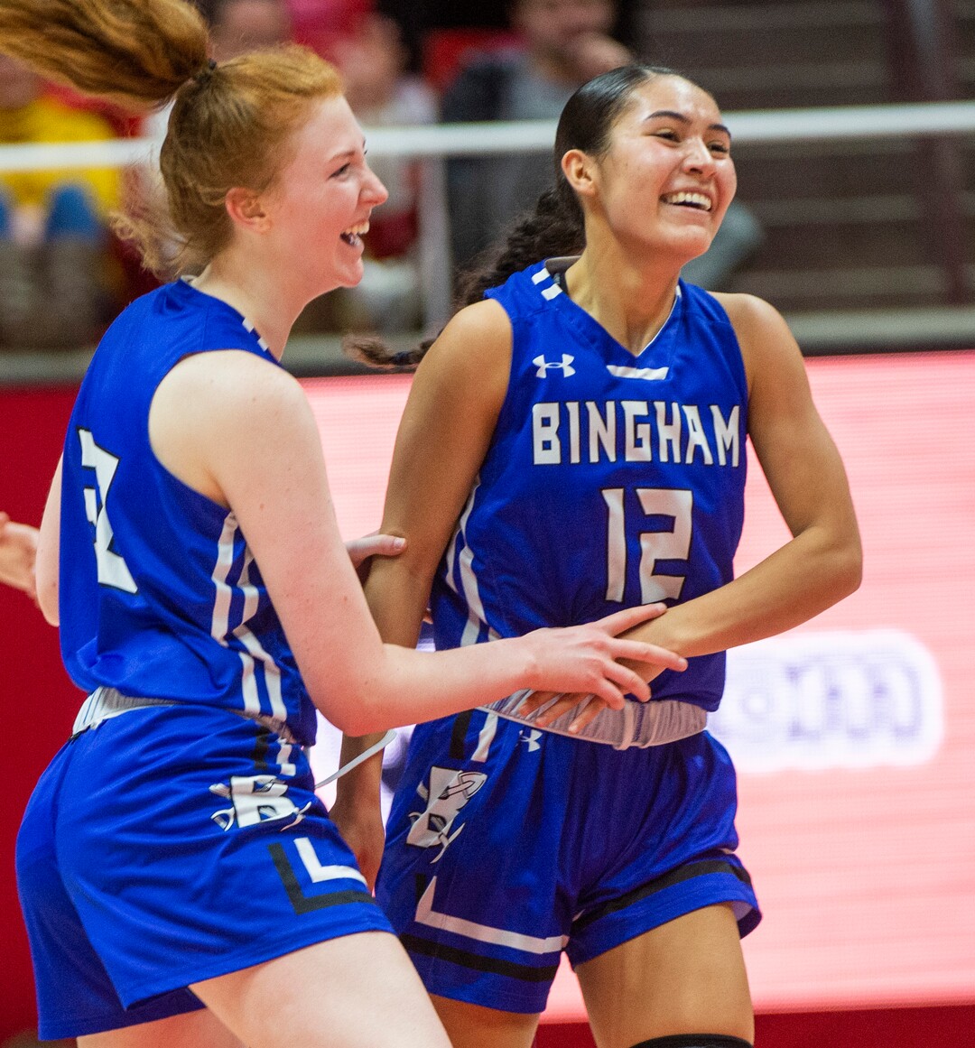 (Rick Egan  |  The Salt Lake Tribune)   Bingham Miners Ameleya Angilau (12) and Samantha  Holman (30) celebrate as hate Miners extend their lead late in the game, in their 59-51 win over the Fremont Silverwolves, in the 6A championship game, at the Jon M. Huntsman Center, Saturday Feb. 29, 2020